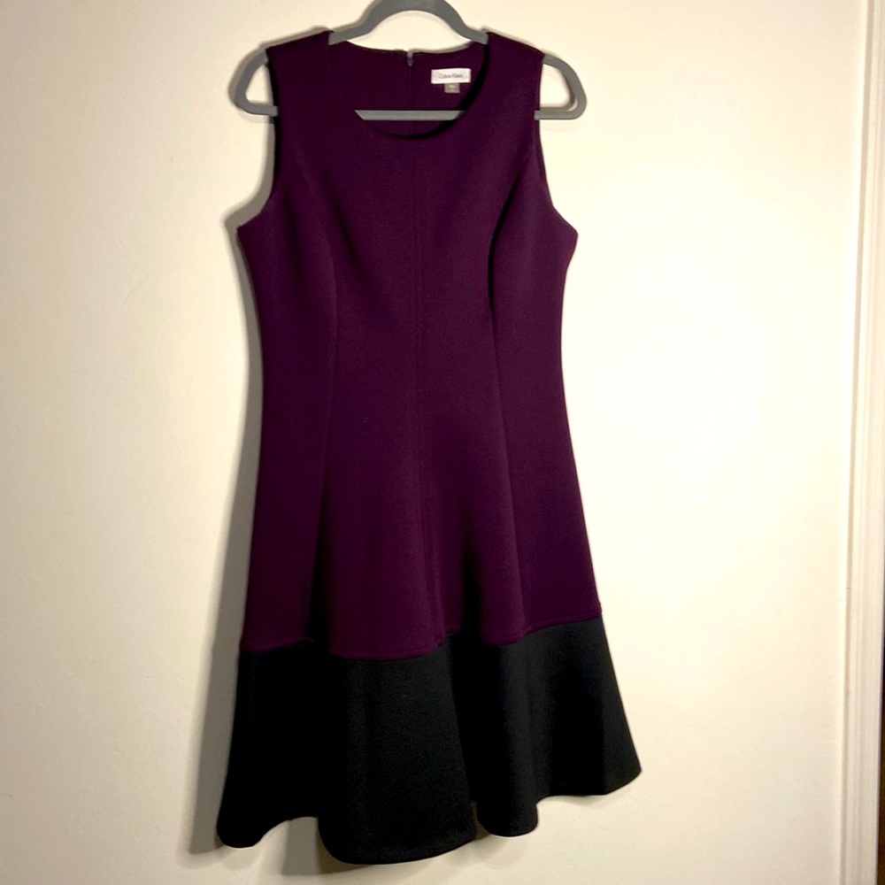 Calvin Klein sleeveless dress fits below the knee nice flair to the bottom